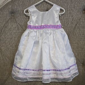 Beautiful 24 Month Formal White Dress With Purple And Pink Sewn Accents.